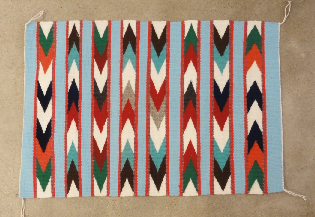 Rare Small American Indian Navajo Rug. A piece of antique tribal woven carpet art sold by Santa Barbara Design Center Rugs and More in Santa Barbara, CA.