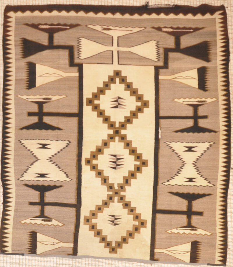 Rare Antique Navajo with Interesting Pattern. An antique tribal woven carpet art sold by Santa Barbara Design Center, Rugs and More in Santa Barbara, CA.