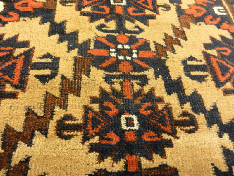 Antique Camelhair Persian Beluch Circa 1900s. A piece of genuine and authentic woven carpet art from Santa Barbara Design Center Rugs and More.