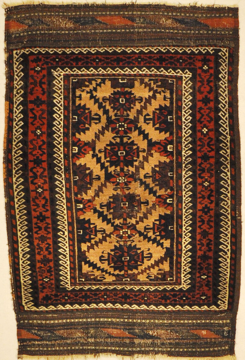 Antique Camelhair Persian Beluch Circa 1900s. A piece of genuine and authentic woven carpet art from Santa Barbara Design Center Rugs and More.