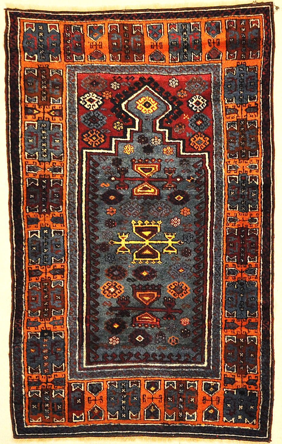 Antique Turkish Yuruk Rare Prayer Rug. A genuine authentic piece of woven carpet art sold at Santa Barbara Design Center Rugs and More.