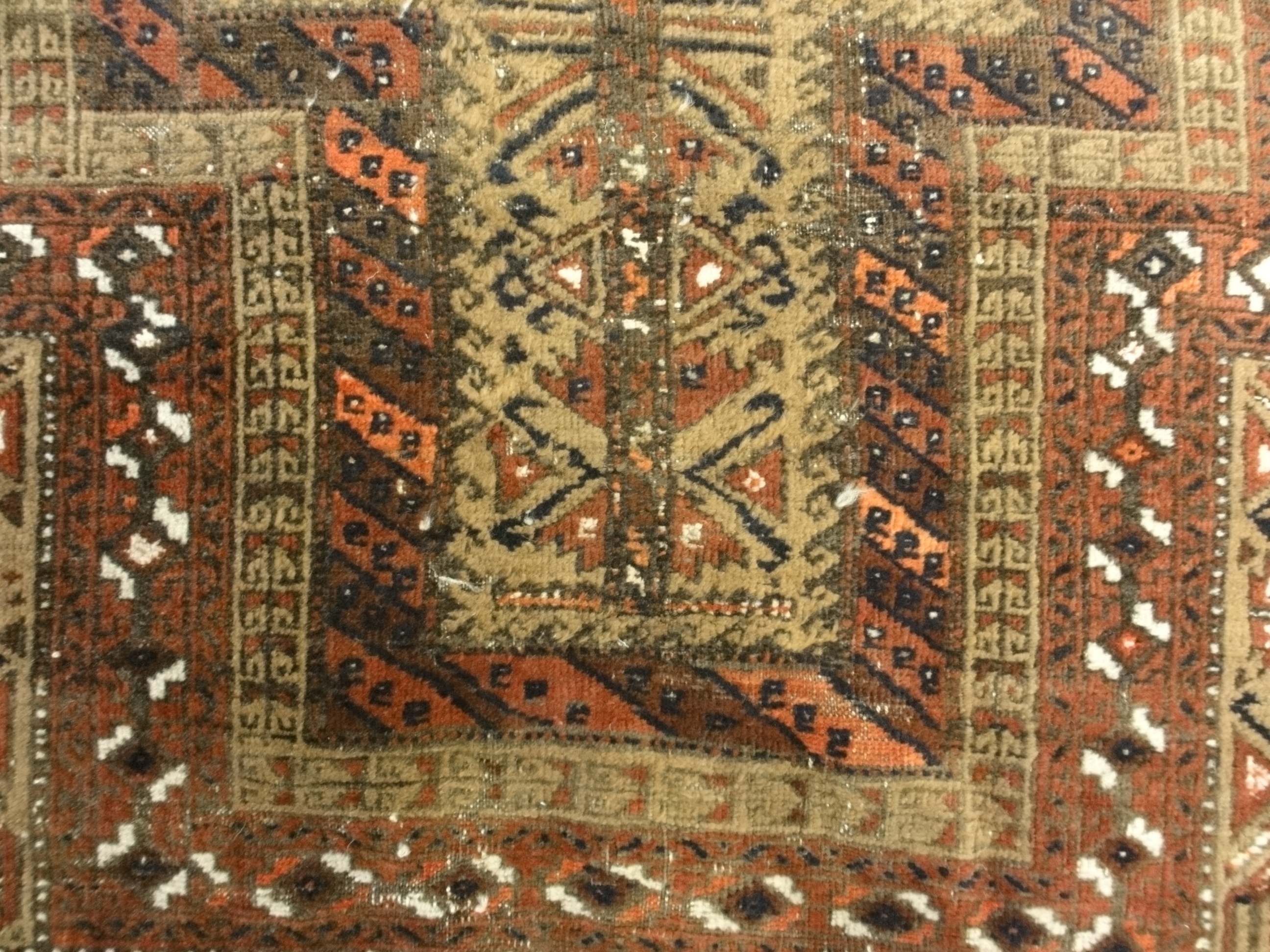 An antique, original Persian Baluch rug. A piece of genuine and authentic carpet art sold at Santa Barbara Design Center. Rugs and More. An antique, original Persian Baluch rug. A piece of genuine and authentic carpet art sold at Santa Barbara Design Center. Rugs and More.
