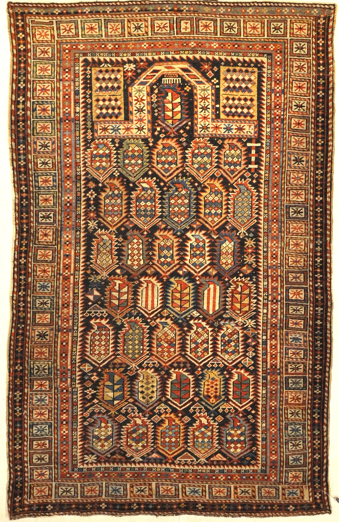 Rarest Antique Maraseli Shirvan Caucasian Prayer Rug. A piece of genuine woven carpet art sold by the Santa Barbara Design Center, Rugs and More.