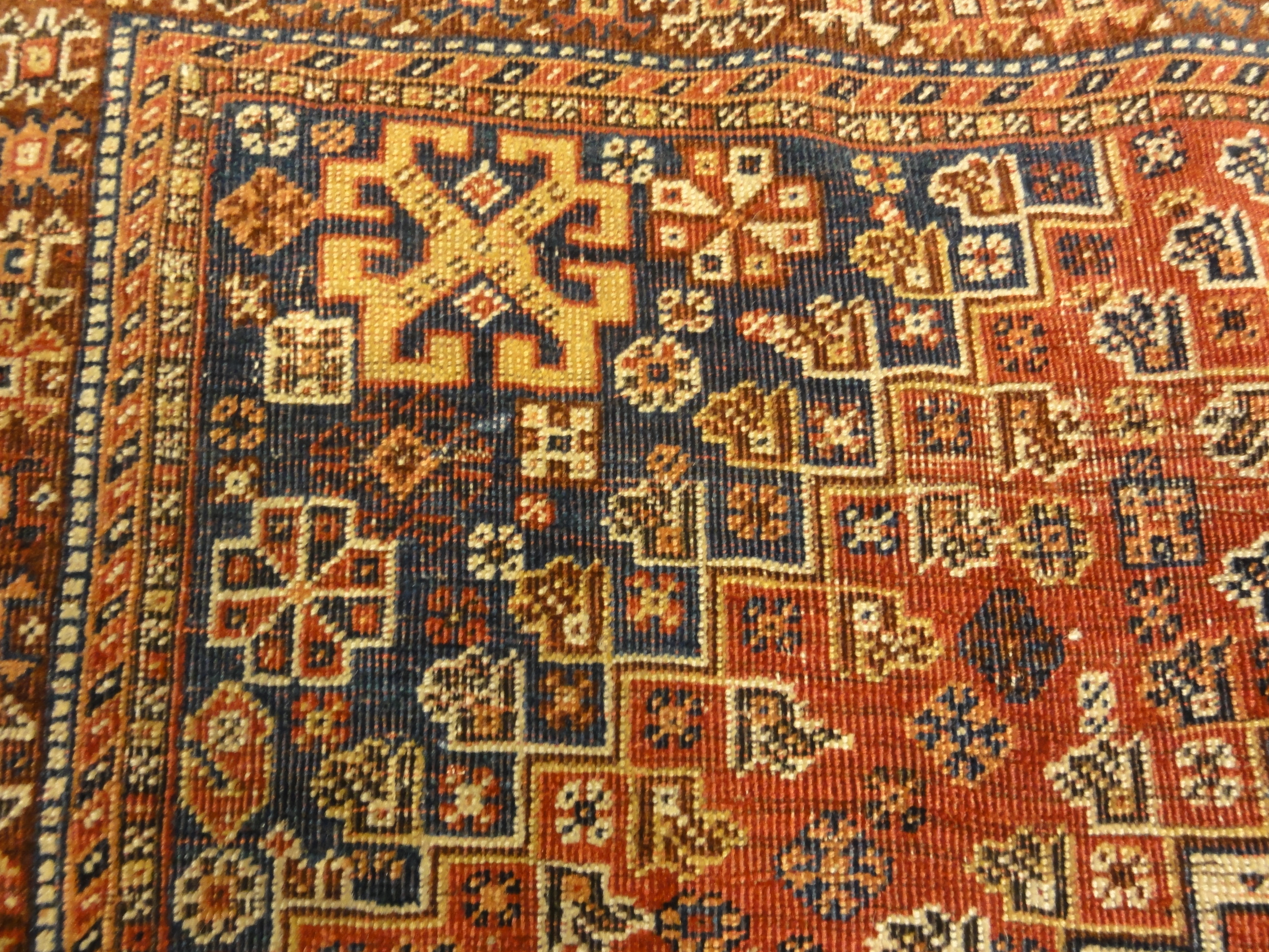Antique Persian Qashqai Rug. A piece of genuine woven carpet art sold by the Santa Barbara Design Center, Rugs and More in Santa Barbara, California.