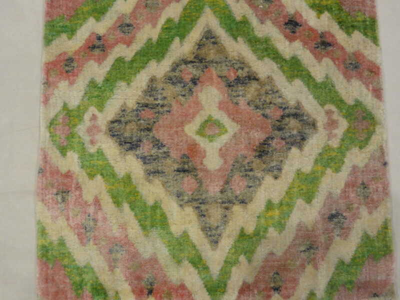 Lovely Patterned Green and Pink Runner. A piece of genuine woven authentic carpet art sold by Santa Barbara Design Center, Rugs and More.