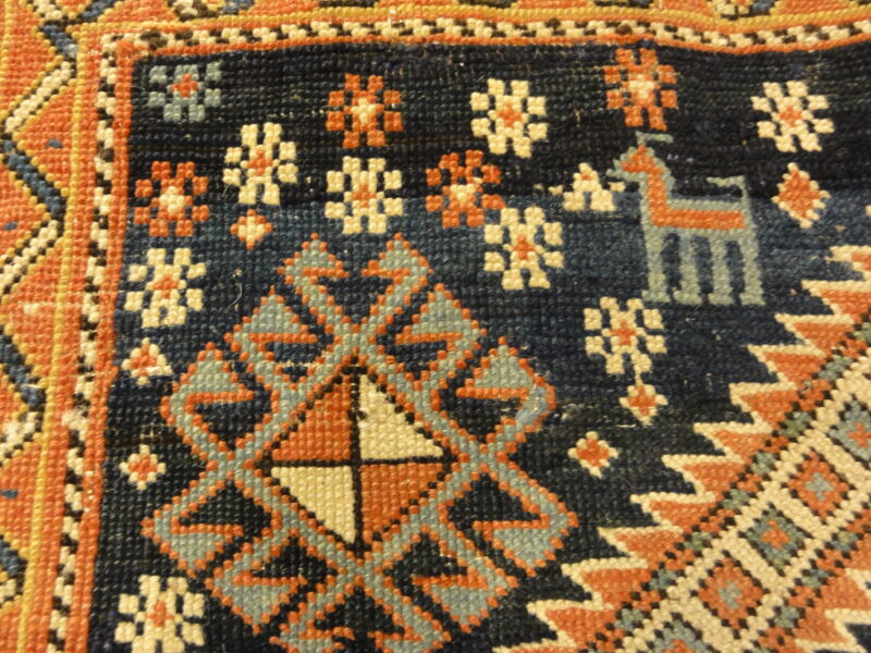 Antique Shirvan Rug Featuring Peacock and Two Men. A genuine authentic antique piece of woven carpet art sold by Santa Barbara Design Center, Rugs and More.