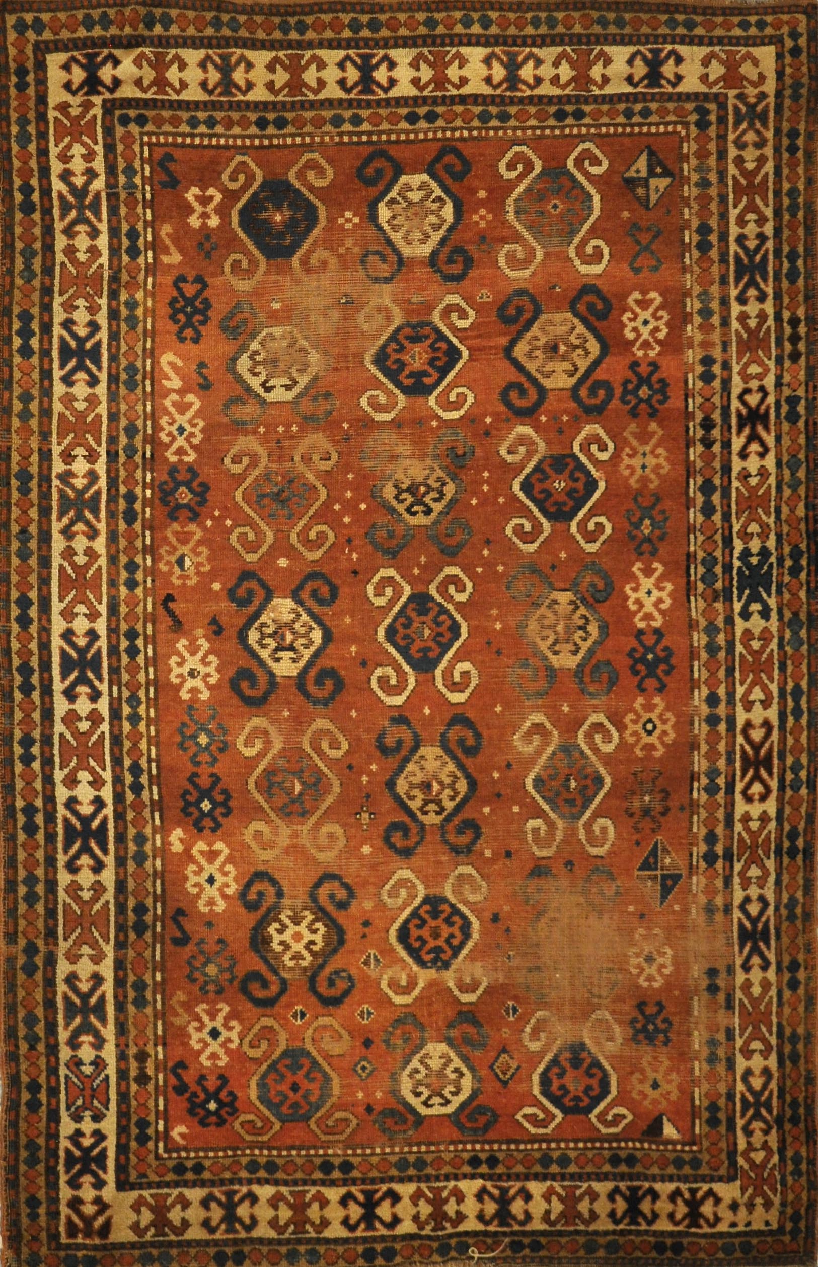 Antique Caucasian Kazak Rug Mid 19th Century. A genuine authentic antique piece of woven carpet art sold by Santa Barbara Design Center Rugs and More.