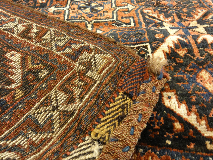 Antique Khamseh Original Southwest Persian Rug. A piece of genuine authentic woven carpet art sold by Santa Barbara Design Center Rugs and More.