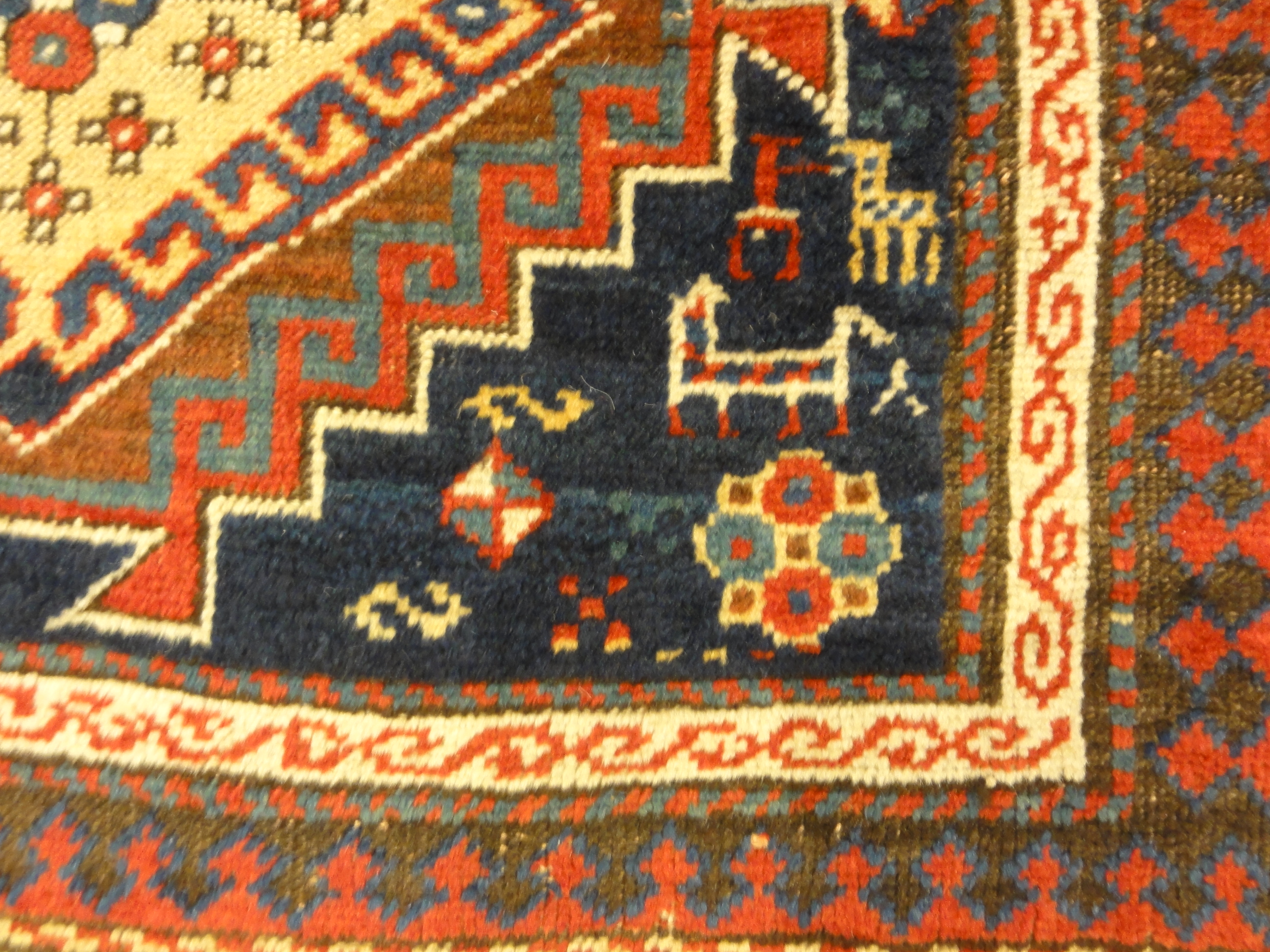 Caucasian Marriage Rug From 1880s. A piece of genuine antique woven carpet art sold by the Santa Barbara Design Center, Rugs and More.
