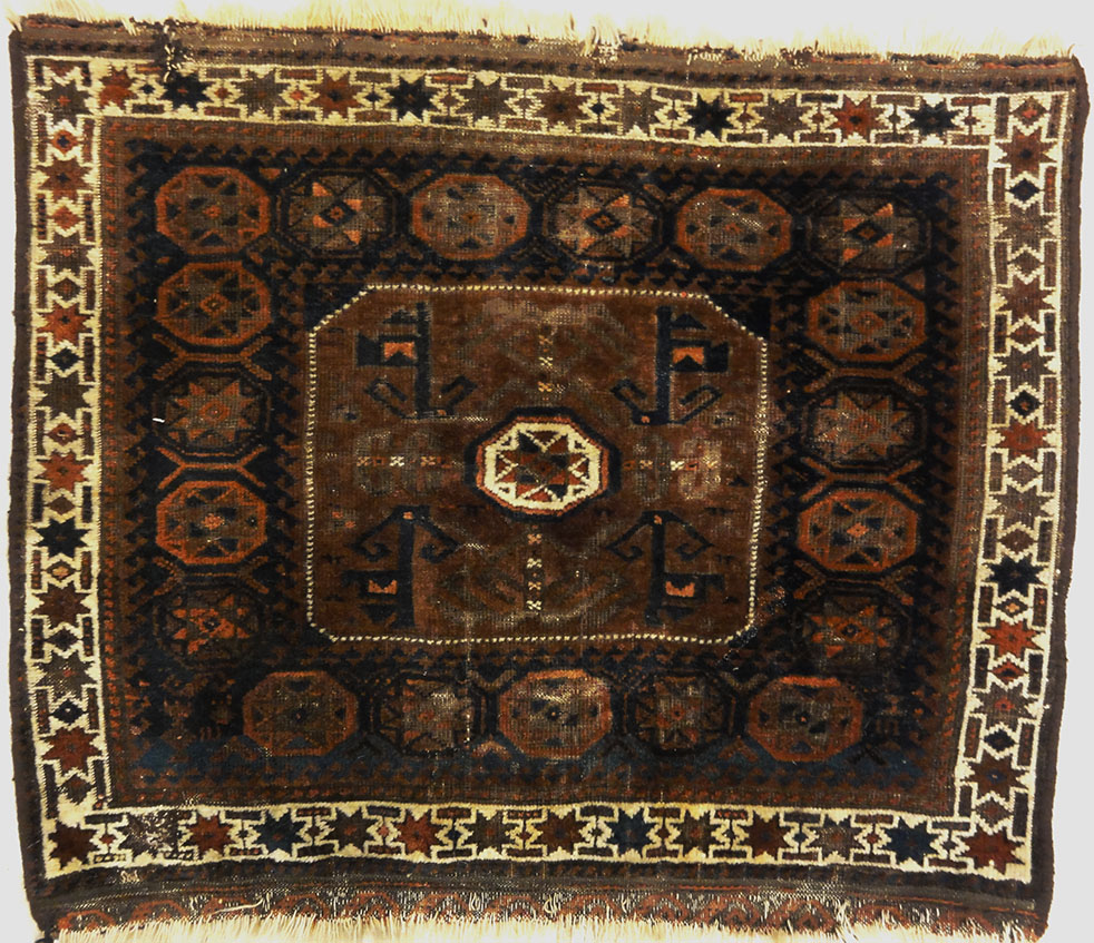 Antique Baluch Bagface. Rugs & More in the Santa Barbara Design Center. This Antique Baluch Bagface is a beauty, unique, and a treasure to be found.