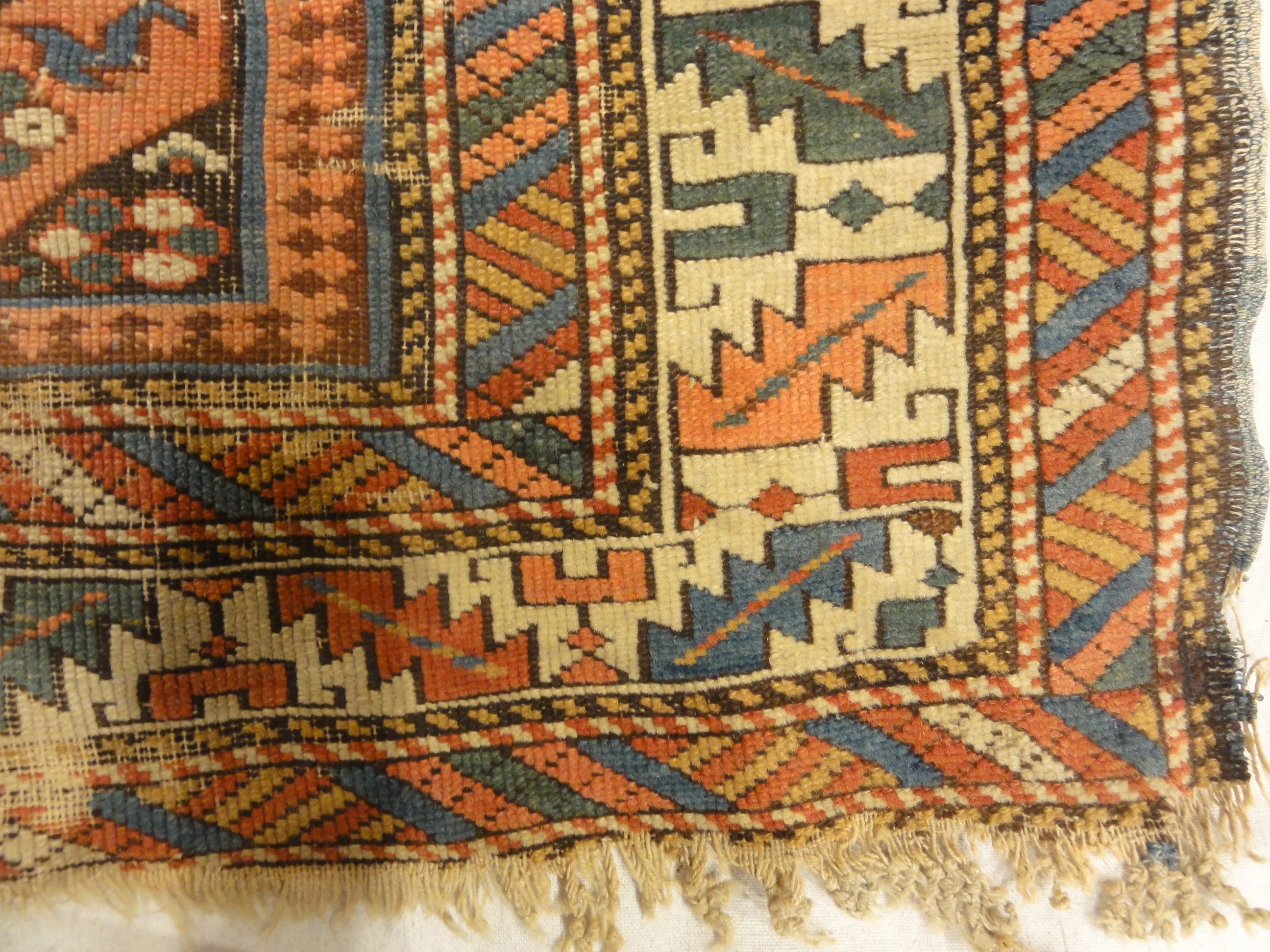 Antique Kuba East Caucasian Rug. A piece of genuine authentic woven carpet art sold by Santa Barbara Design Center, Rugs and More.