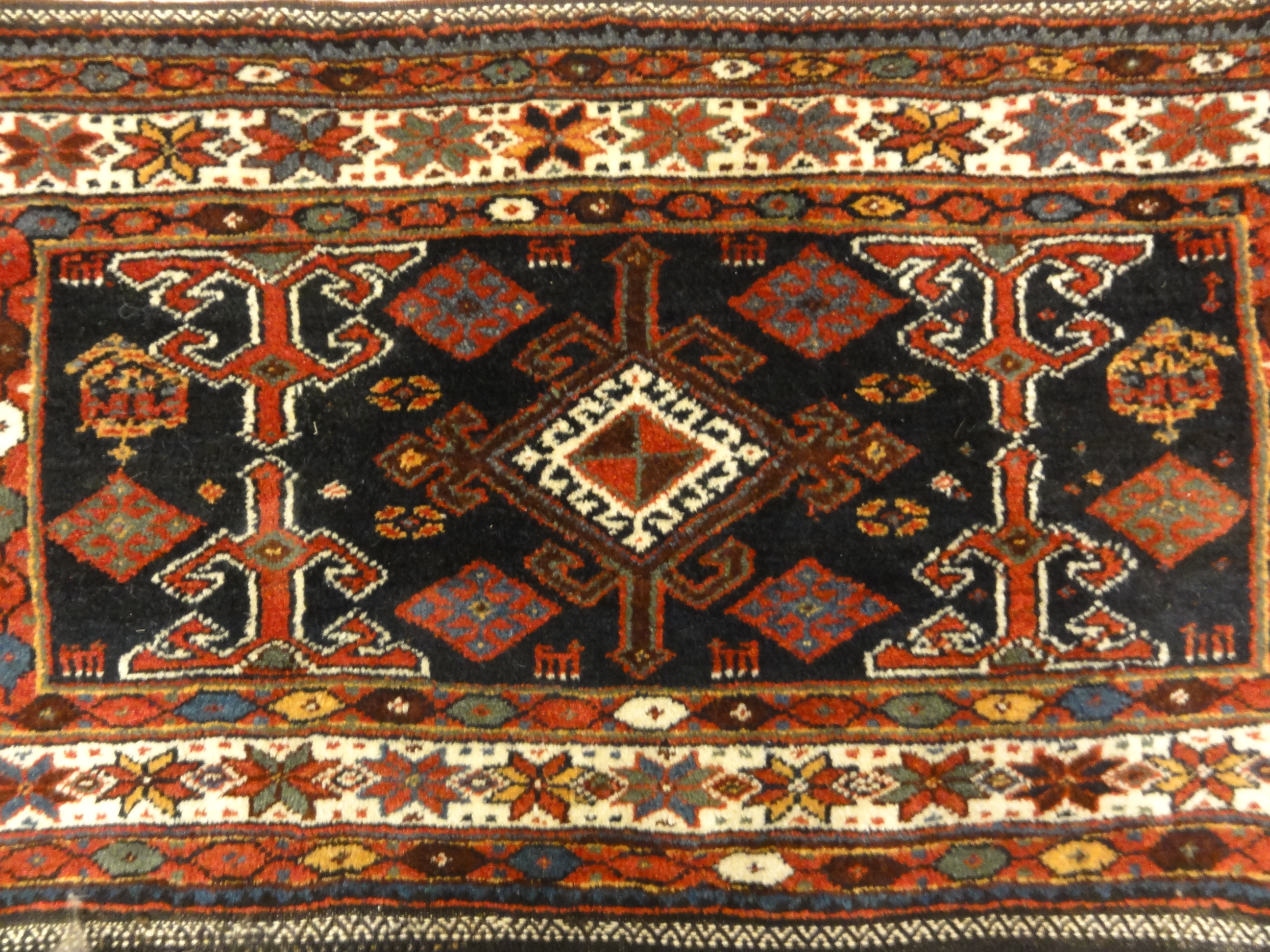 Kurdish Saddle Bag. A piece of genuine authentic antique woven carpet art sold by Santa Barbara Design Center, Rugs and More.