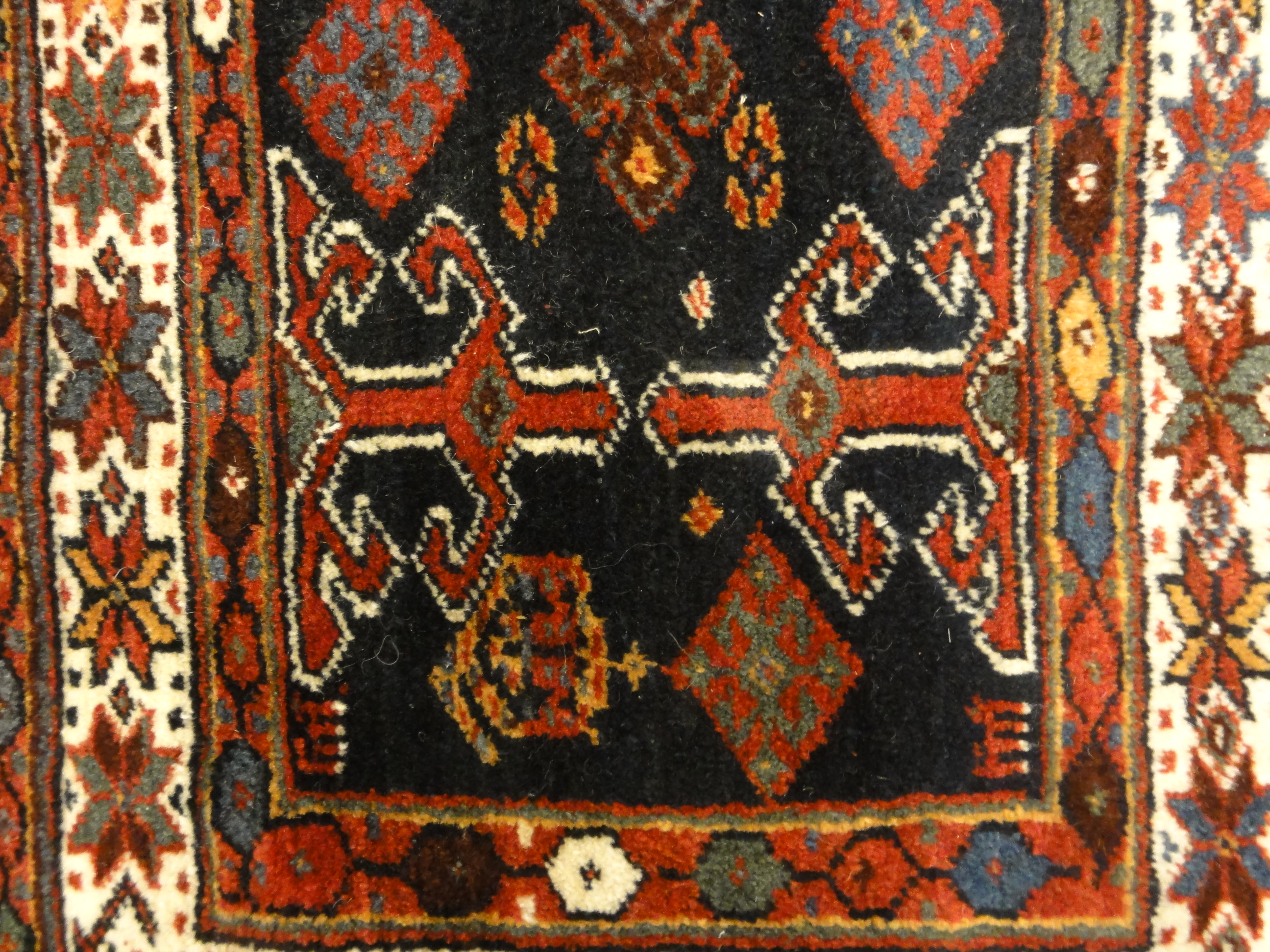Kurdish Saddle Bag. A piece of genuine authentic antique woven carpet art sold by Santa Barbara Design Center, Rugs and More.