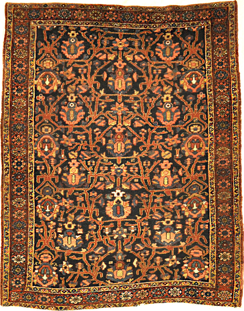 Antique Heriz Rug with a Unique Field. A piece of genuine authentic woven carpet art sold by the Santa Barbara Design Center, Rugs and More.