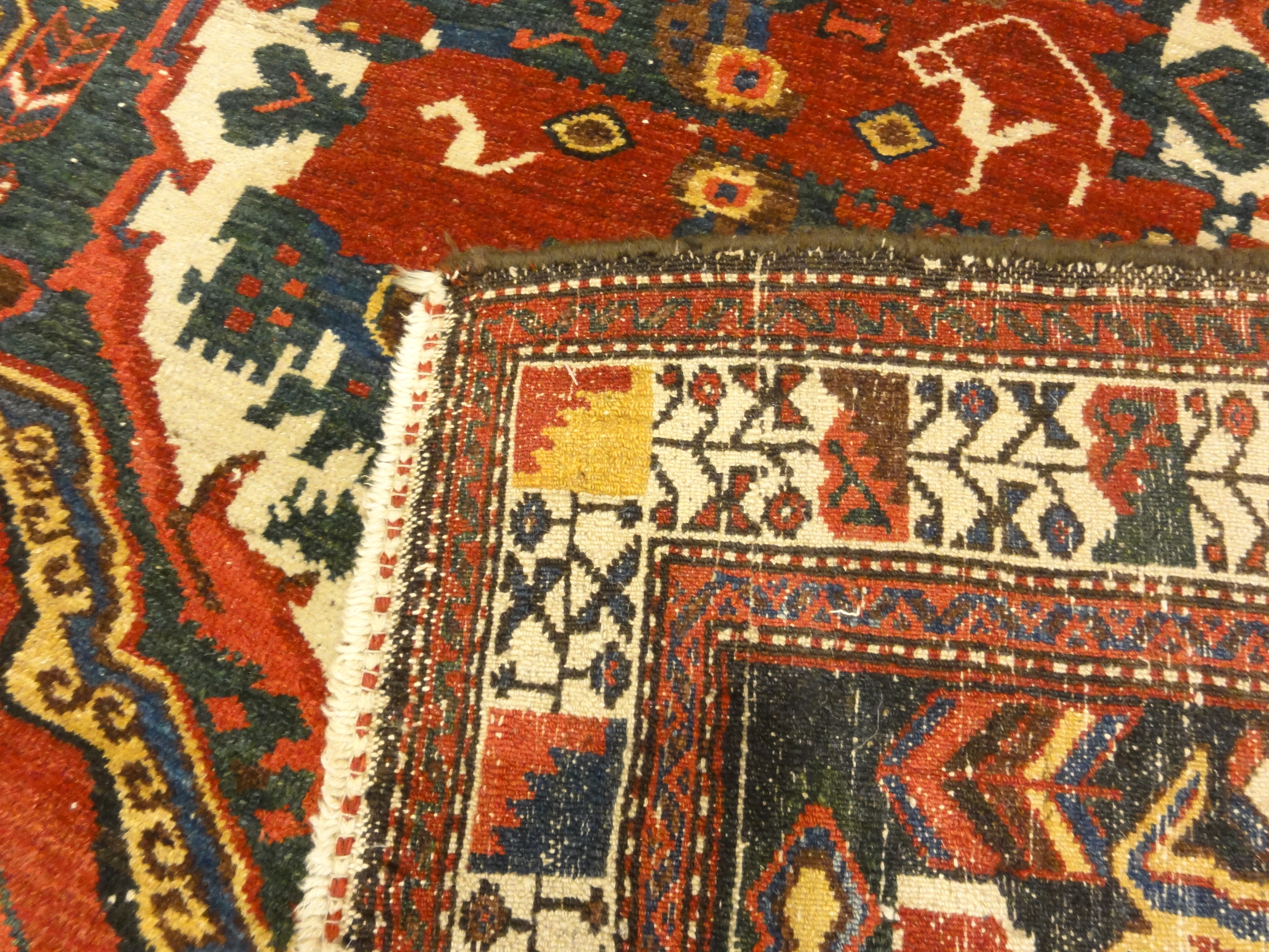 Antique Armenian Gole Farangi Rug A piece of woven antique carpet art sold by the Santa Barbara Design Center Rugs and More.