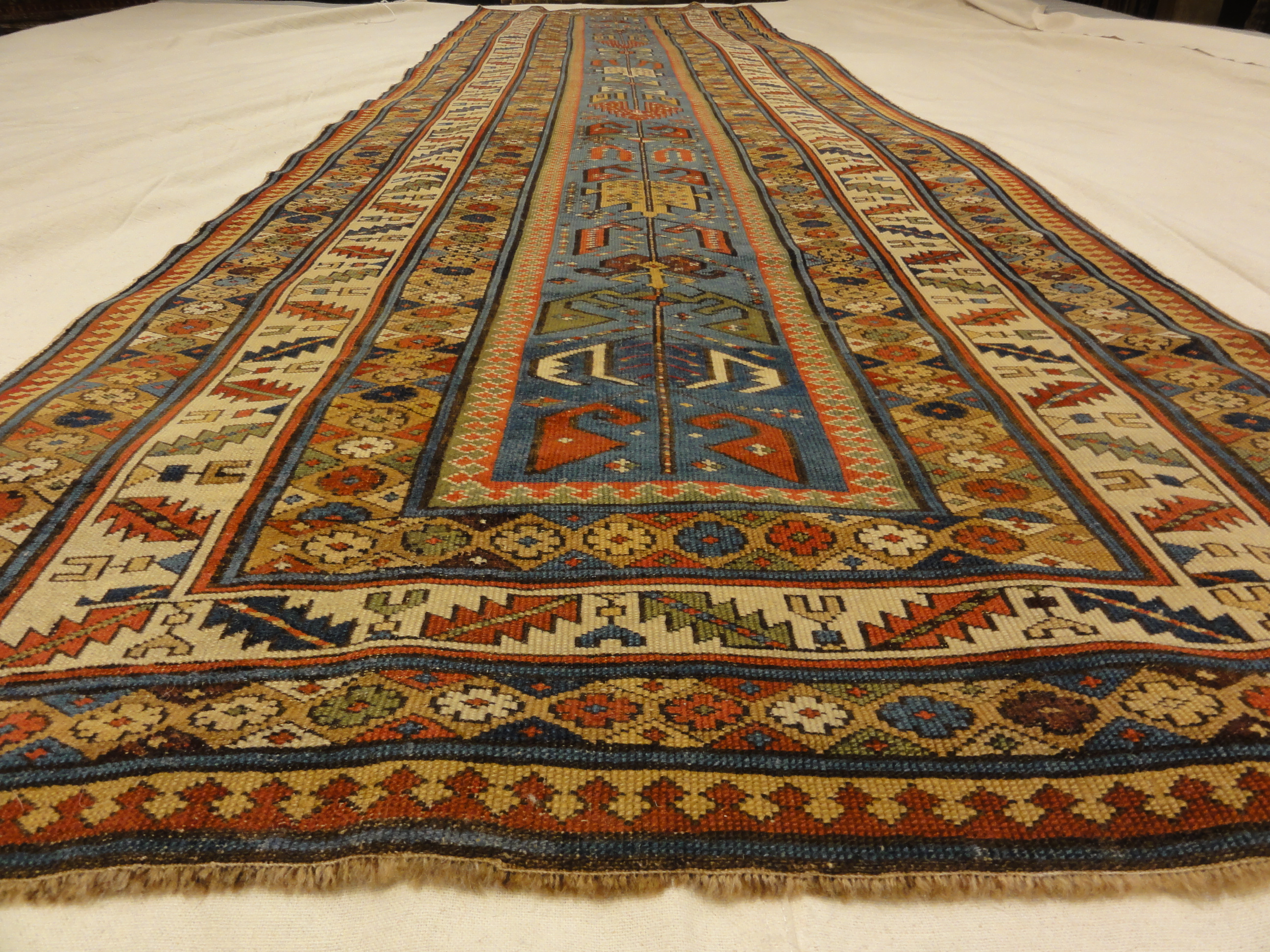 Antique Early 19th Century Shirvan Runner Rug. A piece of genuine authentic woven carpet art sold by the Santa Barbara Design Center Rugs and More.