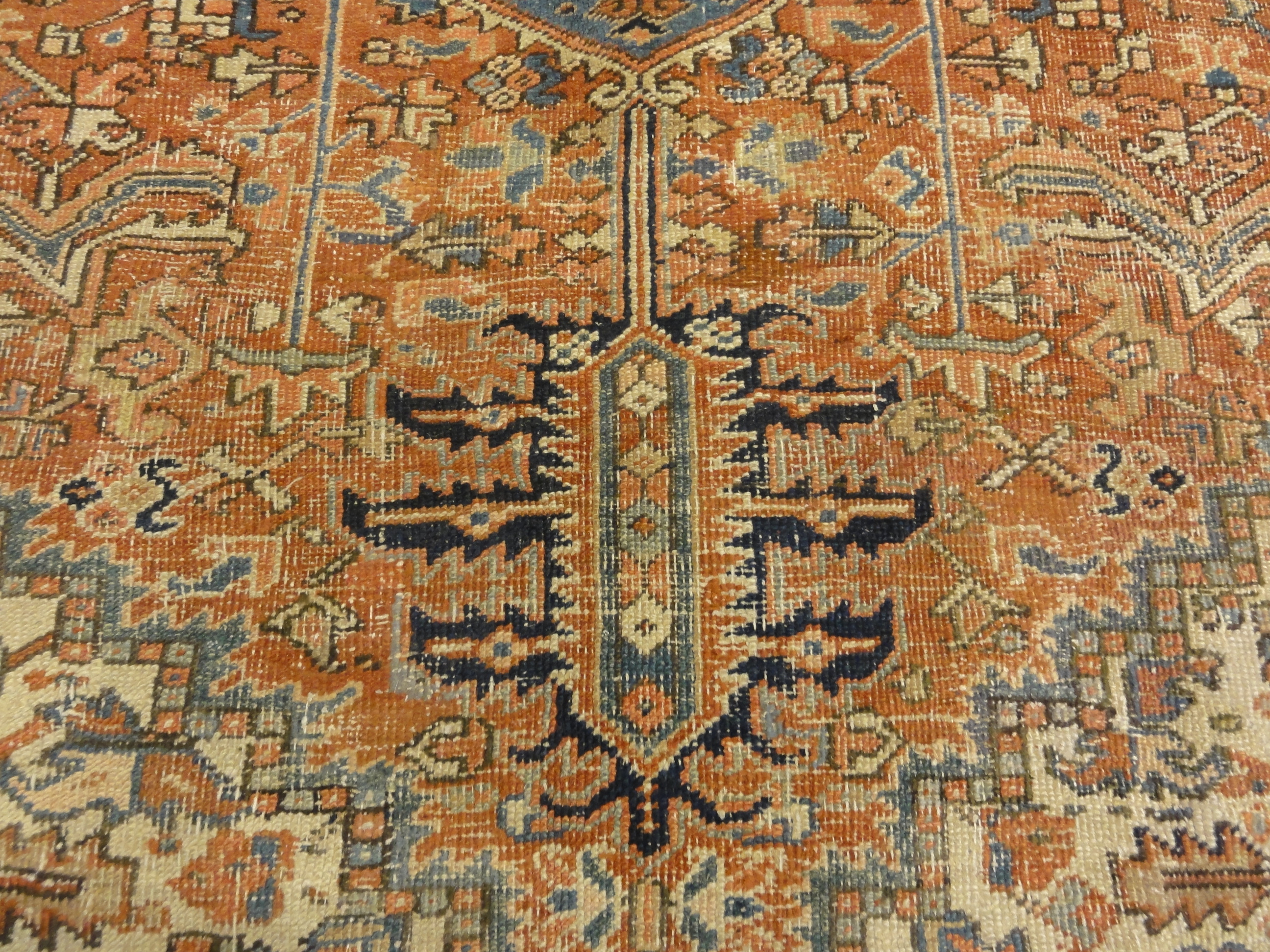 Antique Heriz Rug. A piece of genuine authentic antique woven carpet art sold by the Santa Barbara Design Center, Rugs and More.