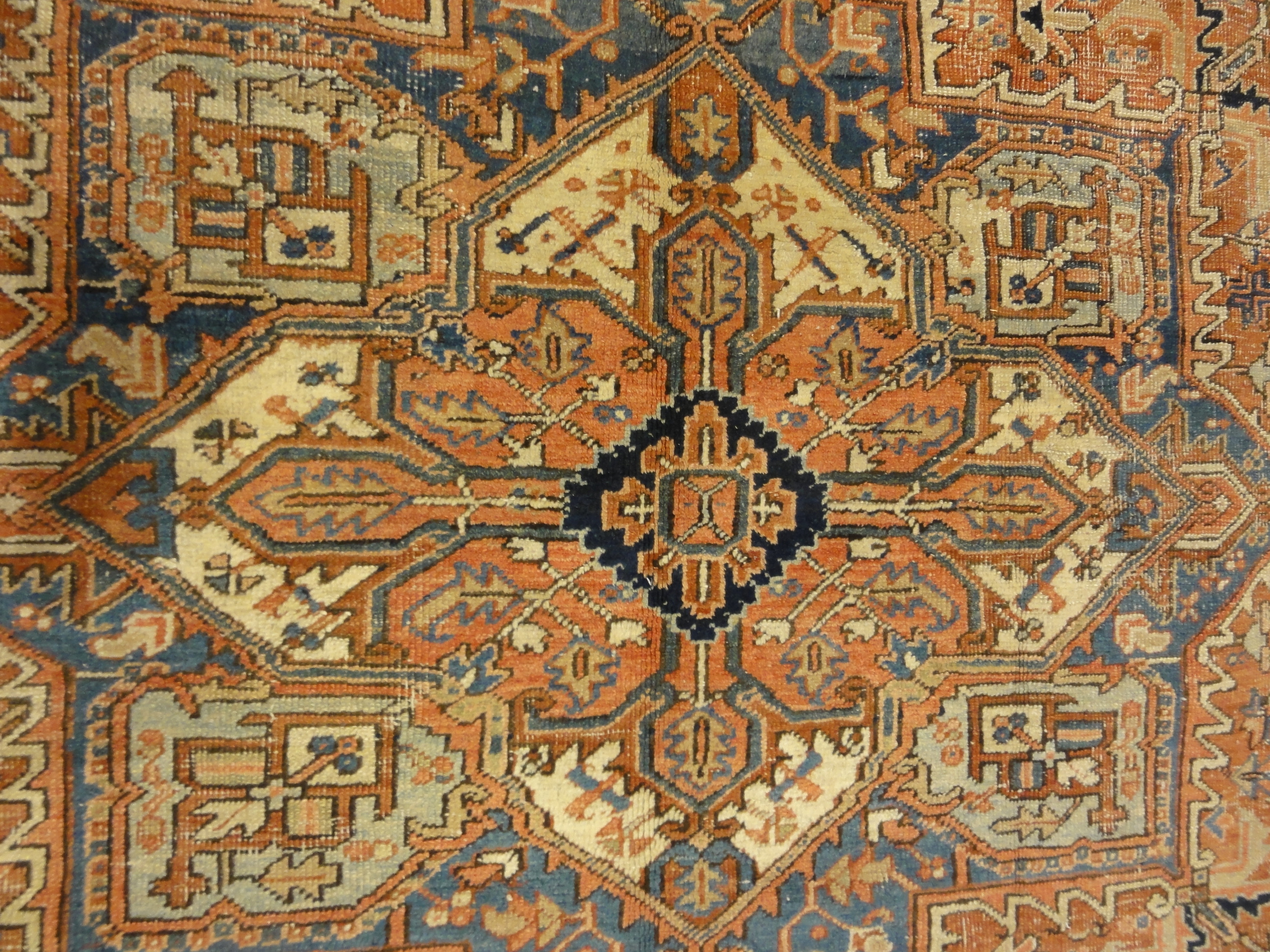 Antique Heriz Rug. A piece of genuine authentic antique woven carpet art sold by the Santa Barbara Design Center, Rugs and More.