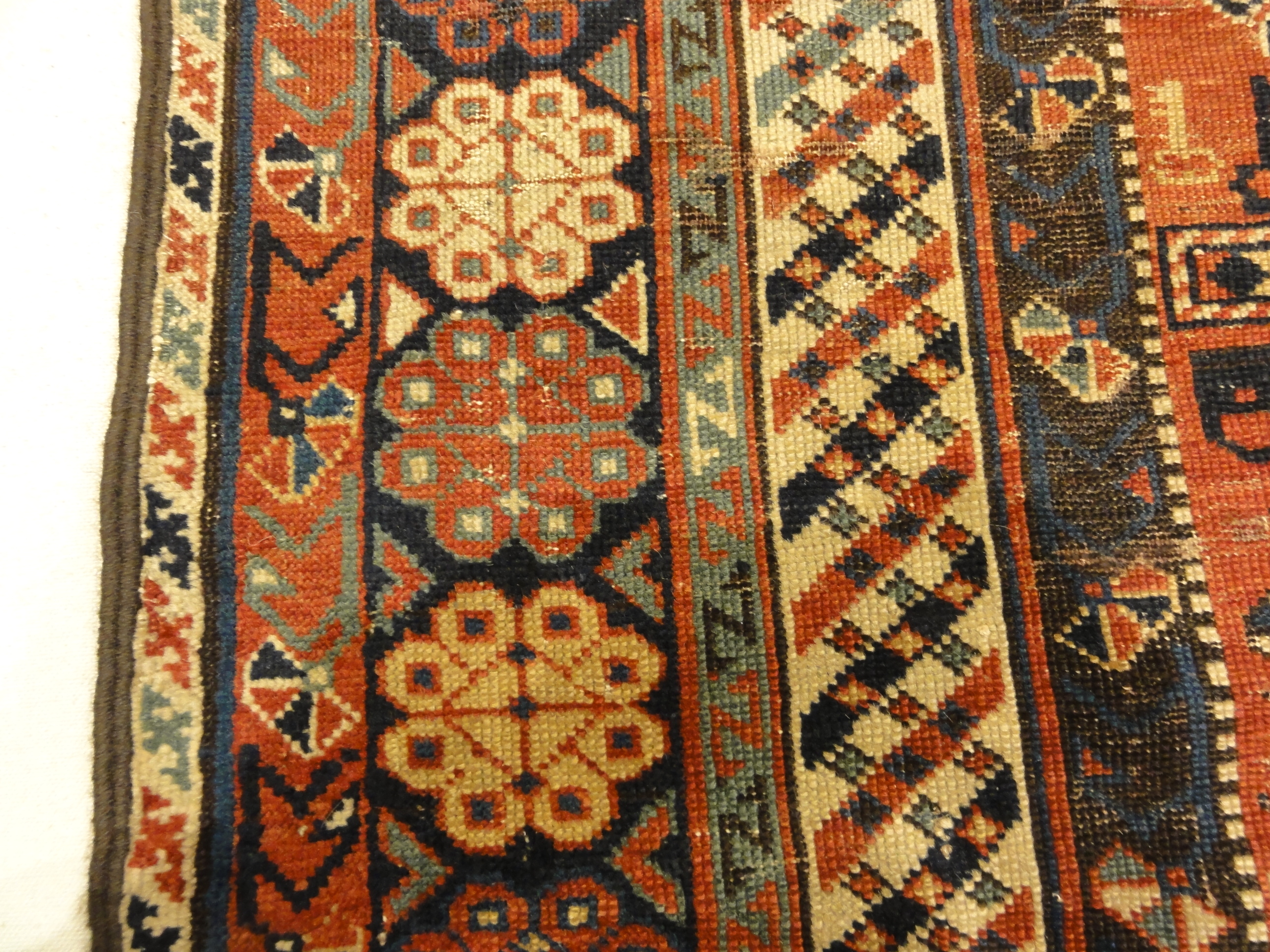 Fine Antique Shirvan Woven by an Armenian Girl. A piece of genuine authentic woven carpet art sold by the Santa Barbara Design Center Rugs and More.