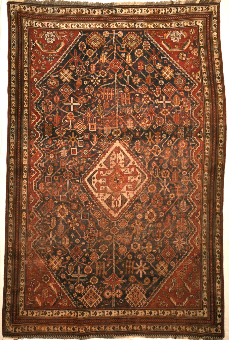 Antique Qashqai Rug. A piece of genuine antique authentic woven carpet art sold by the Santa Barbara Design Center, Rugs and More.