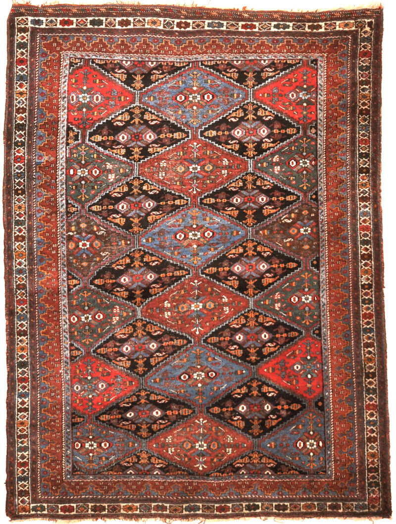Fine Antique Afshar Rug. A genuine authentic antique piece of woven carpet art sold by Santa Barbara Design Center, Rugs and More.