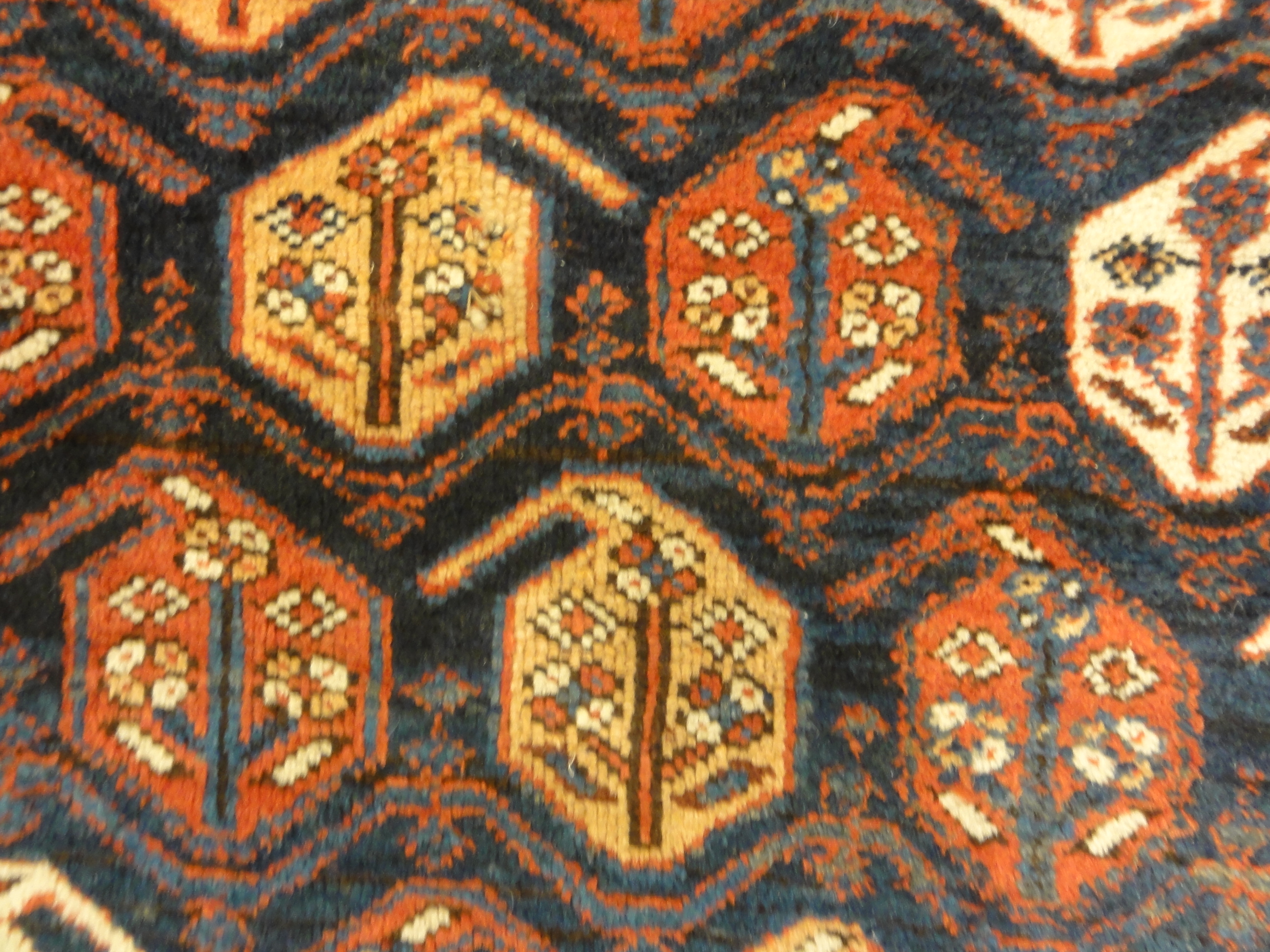Rare 1870s Antique Boteh Afshar. A piece of authentic genuine antique woven carpet art sold by Santa Barbara Design Center, Rugs and More.
