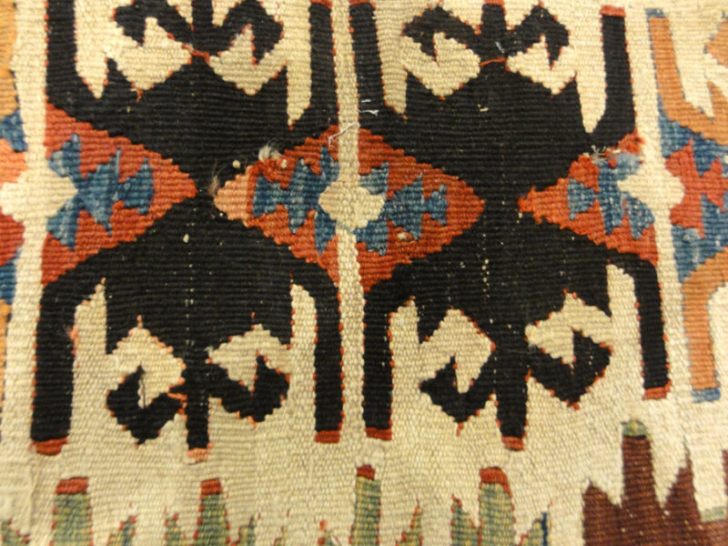 Anatolia Goddess Turkish Kelim ca Late 1700s. A piece of antique woven carpet art sold by the Santa Barbara Design Center, Rugs and More in California.