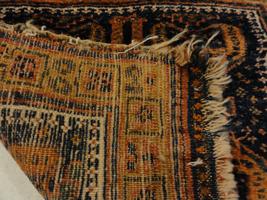 Antique Kurdish West Persian Bagface with Peacocks. A piece of genuine authentic antique woven carpet art sold by Santa Barbara Design Center Rugs and More