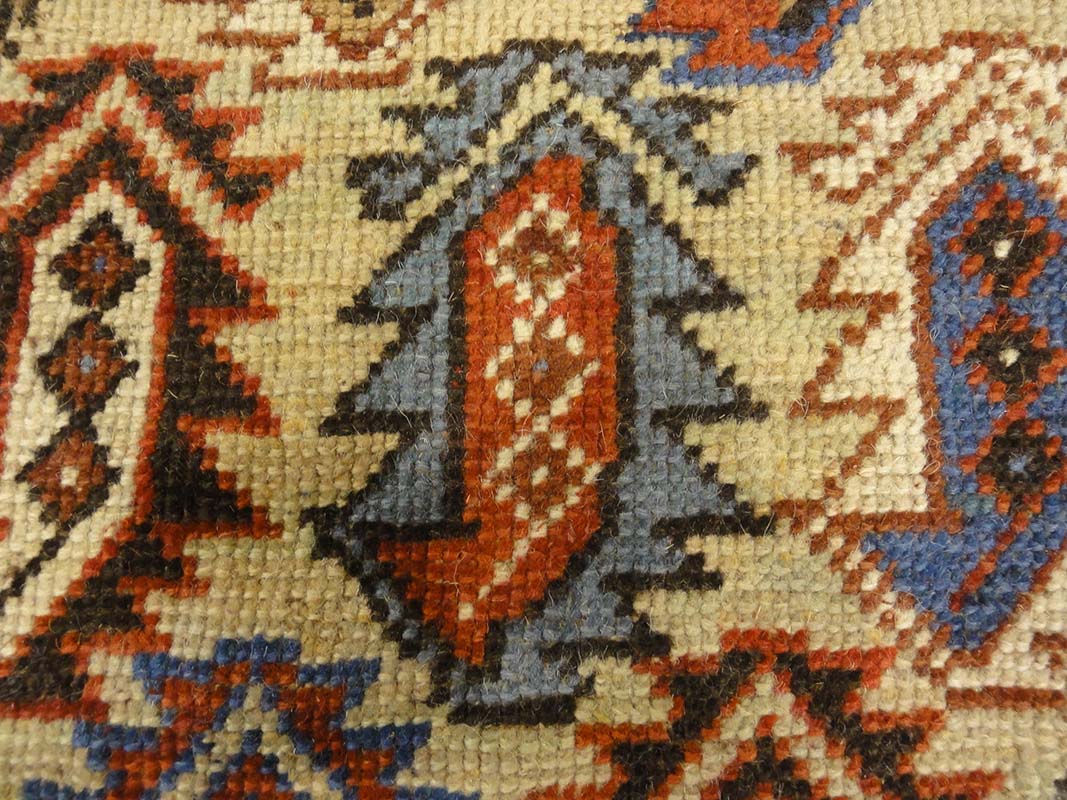 Antique Caucasian Shirvan Botteh Motif. Antique piece of woven carpet art sold by the Santa Barbara Design Center, Rugs and More in Santa Barbara, CA