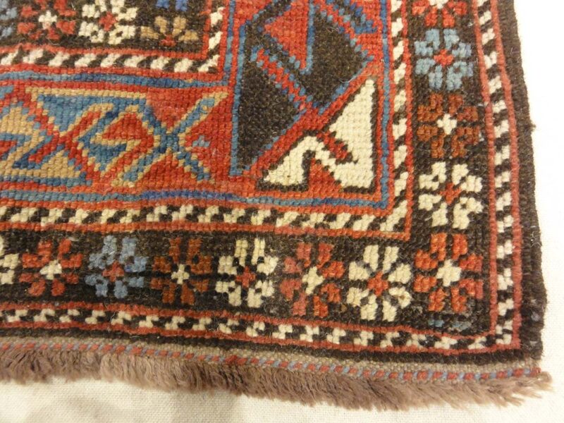 Antique Caucasian Shirvan Botteh Motif. Antique piece of woven carpet art sold by the Santa Barbara Design Center, Rugs and More in Santa Barbara, CA