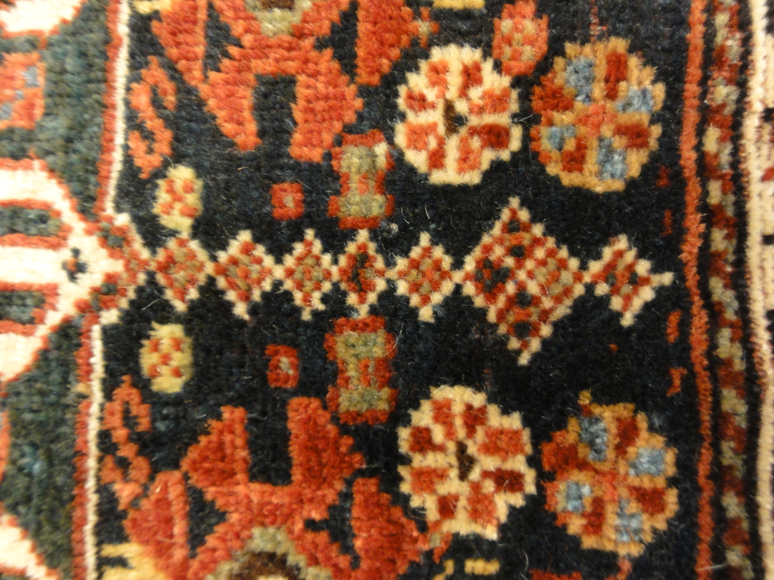Antique Khamseh Southwest Persian Bagface. A piece of antique woven carpet art sold by Santa Barbara Design Center Rugs and More in Santa Barbara, CA.