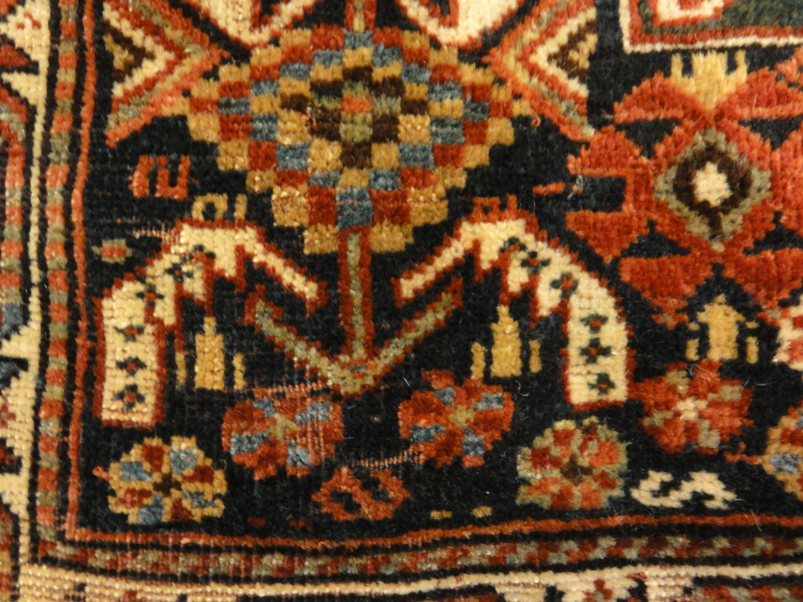 Antique Khamseh Southwest Persian Bagface. A piece of antique woven carpet art sold by Santa Barbara Design Center Rugs and More in Santa Barbara, CA.