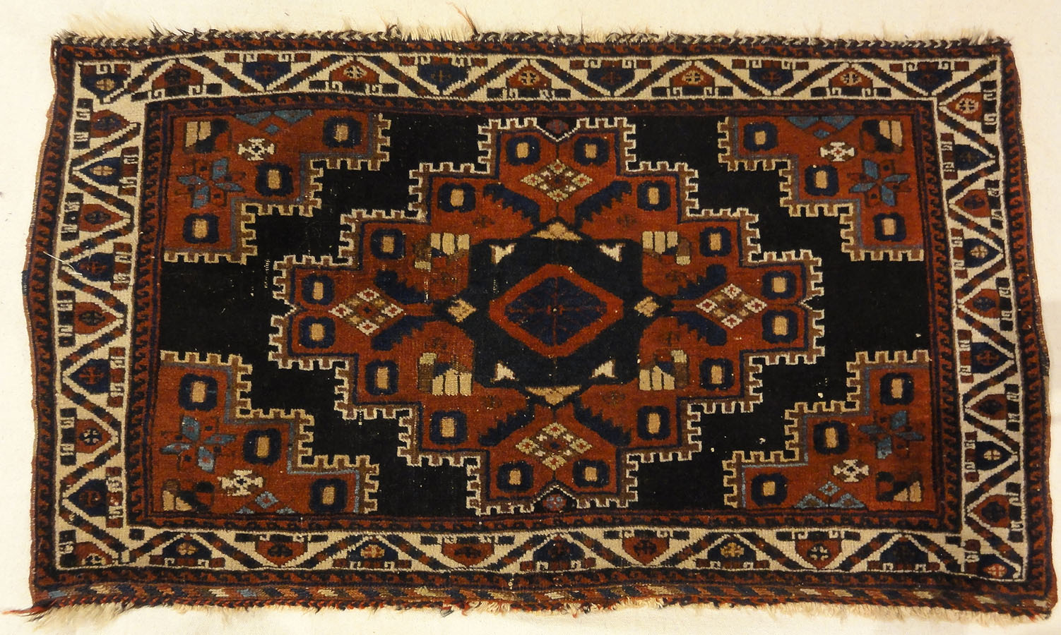 Fine Southwest Persian Afshar Bagface. A piece of woven carpet art sold by the Santa Barbara Design Center Rugs and More in Santa Barbara, California.